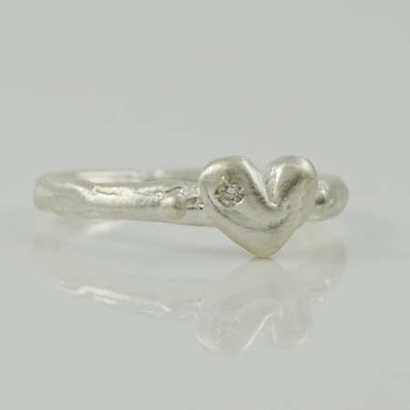 Petite silver heart ring with diamond in sterling silver by Amery Carriere