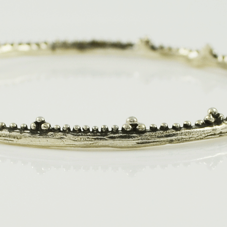 unique silver and edgy bangle