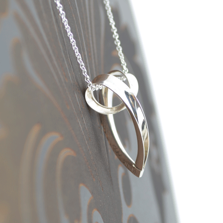 Open silver swirl heart pendant