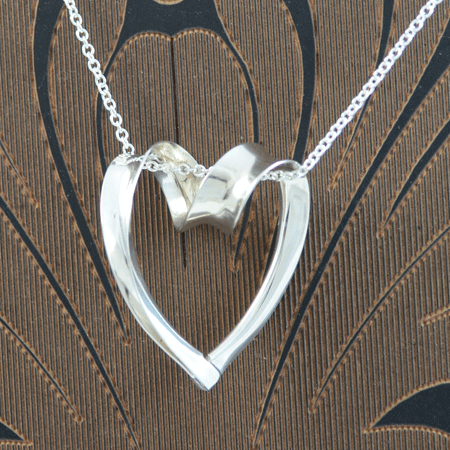 Open silver swirl heart pendant