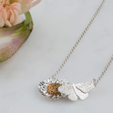 Butterfly and daisy silver necklace