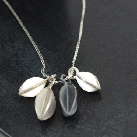 silver necklace with pods