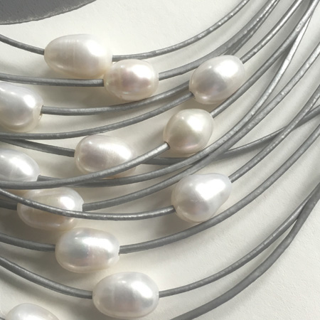 leather pearl necklace close up
