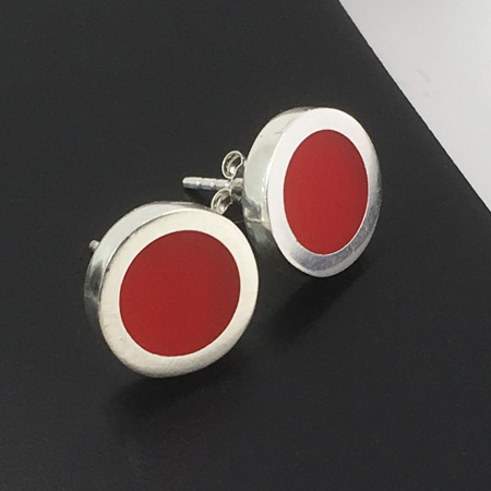 Contemporary red resin silver studs handmade in Australia. Red polka dot silver stud earrings