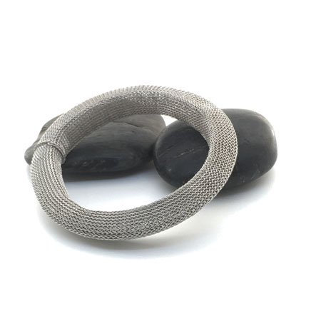 Milena Zu mesh bangle called Menkar. Crocheted in stainless steel, this mesh bangle is part of our large range of Milena Zu jewellery.