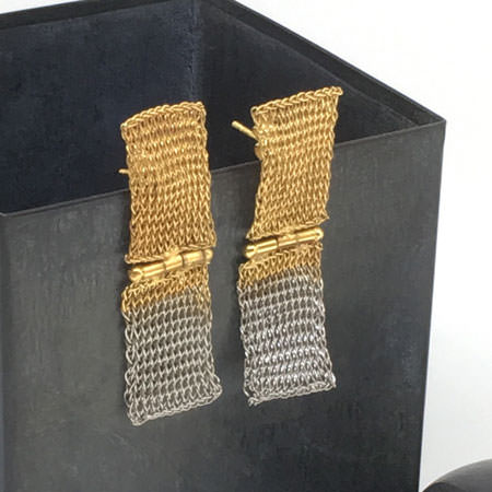 Milena Zu earrings in crocheted stainless steel wire and partly gold plated. Part of our large range of Milena Zu jewellery available online.