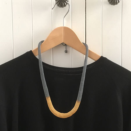 Gold Mirzam necklace by Milena Zu. Large range of Milena Zu jewellery available here.