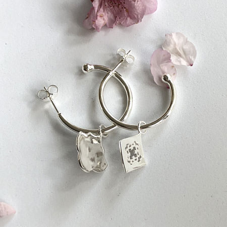 mismatched silver hoops