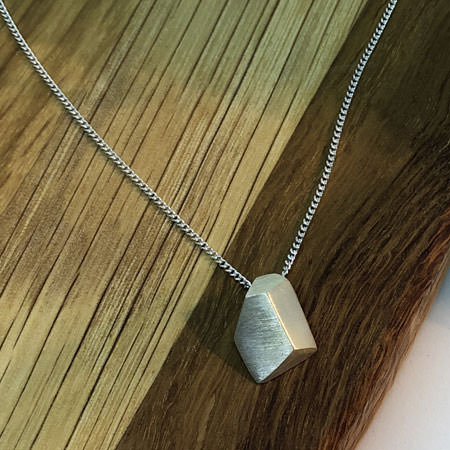 Graphic silver pendant