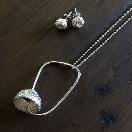 Long acorn silver pendant