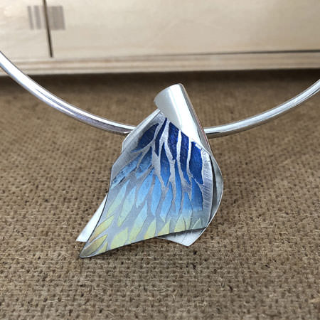 floating silver niobium pendant