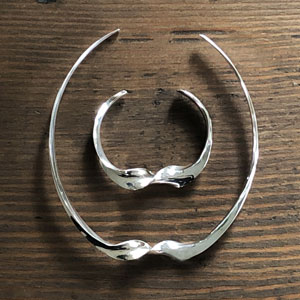 Twisted silver choker necklace and cuff bracelet