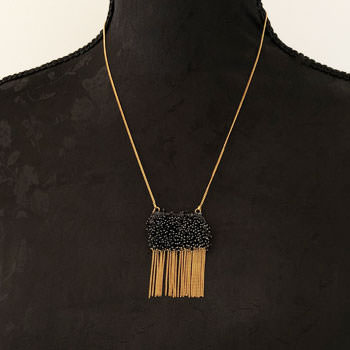 gold plated necklace with black beads