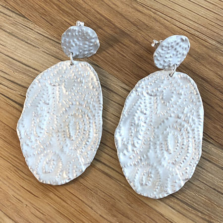 Large pressed silver earrings