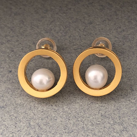 Gold pearl stud earrings